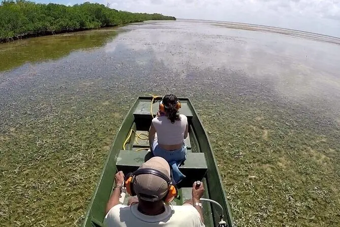Airboat traveling through the shallow lagoon