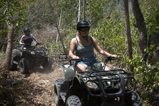 Guided ATV group on the Isla Blanca trail